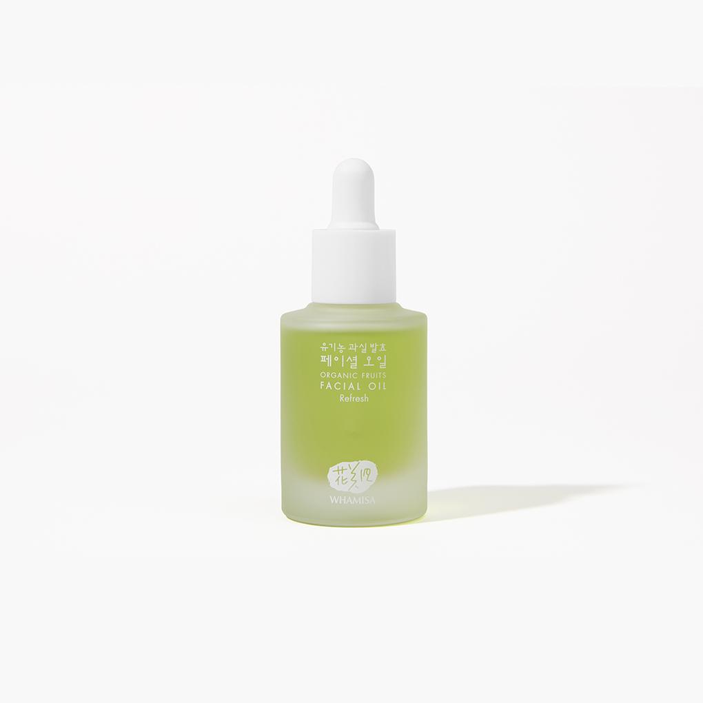 ﻿Whamisa ﻿Organic Flowers Facial Oil Refresh bottled in a semi-transparent bottle with lime green content inside. The cap works as a dropper. 