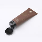 Load image into Gallery viewer,  just now   Whamisa Organic Seeds Hair Treatment in brown tube with black cap.
